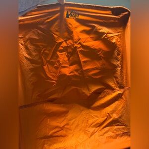 REI Orange and Asphalt colored flexlite chairs